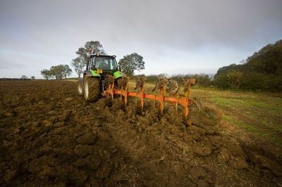 Tractor and plough